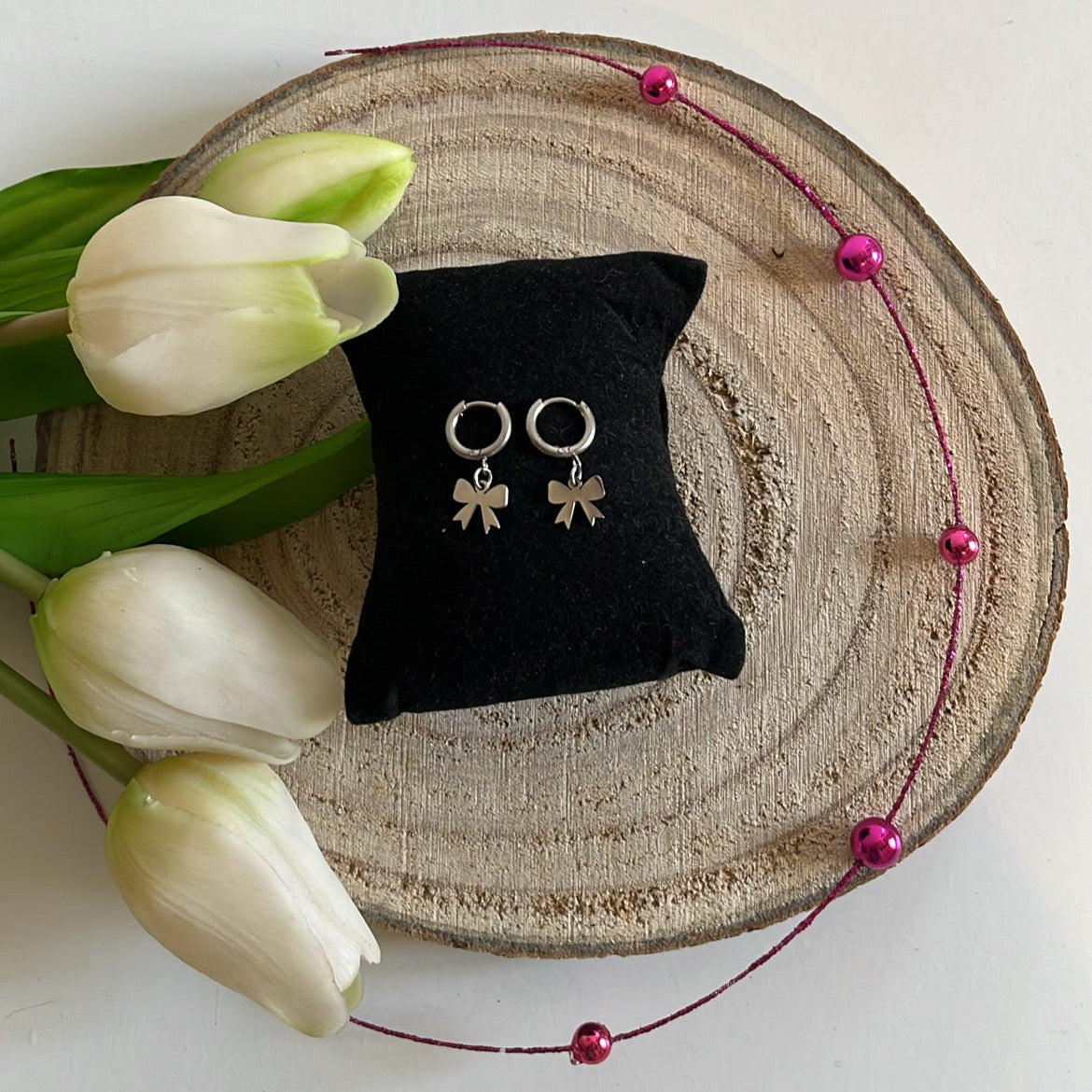 Boucle d'oreille nœud papillon